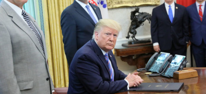 2019-07-01T214935Z_48033954_RC18D1E53FA0_RTRMADP_3_USA-IMMIGRATION-TRUMP-965x440